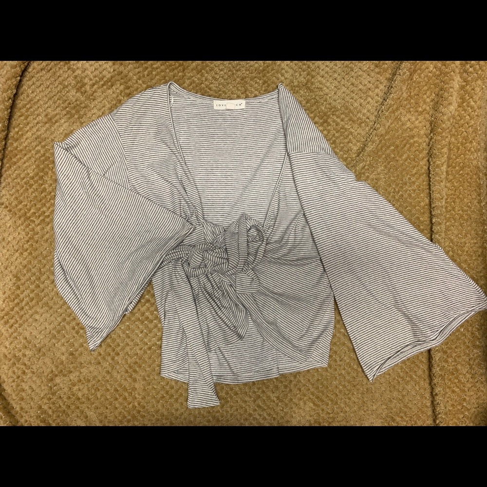 VICI bell sleeve wrap around top